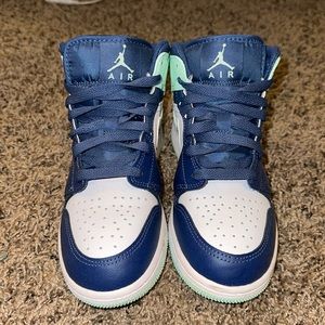 navy blue and teal air jordan’s